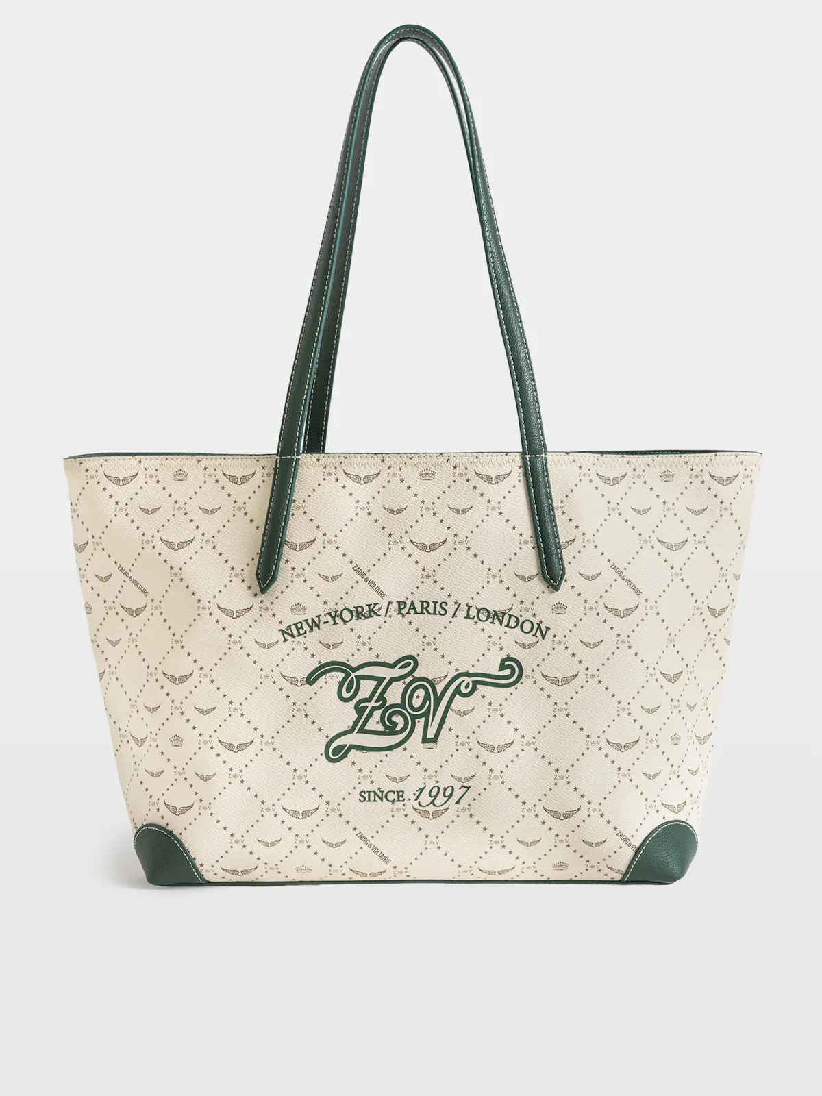 Z Shopper tote in ecru canvas printed with the green monogram, with green handles, on a grey studio background.