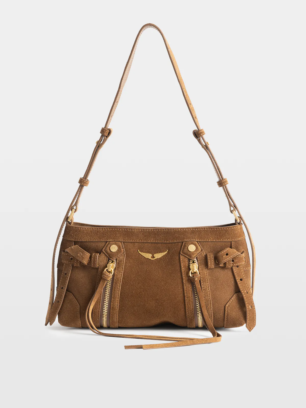 Madison bag in cognac suede with fringing, gold zips and wings, on a grey studio background.