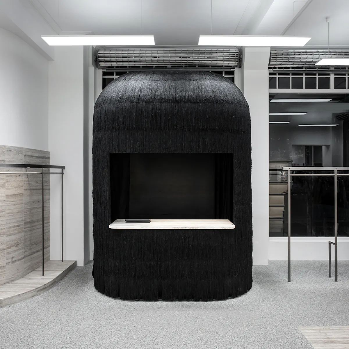 The till at the King’s Road boutique, a black, long-fringed volume shaped like a Royal Guard bearskin.